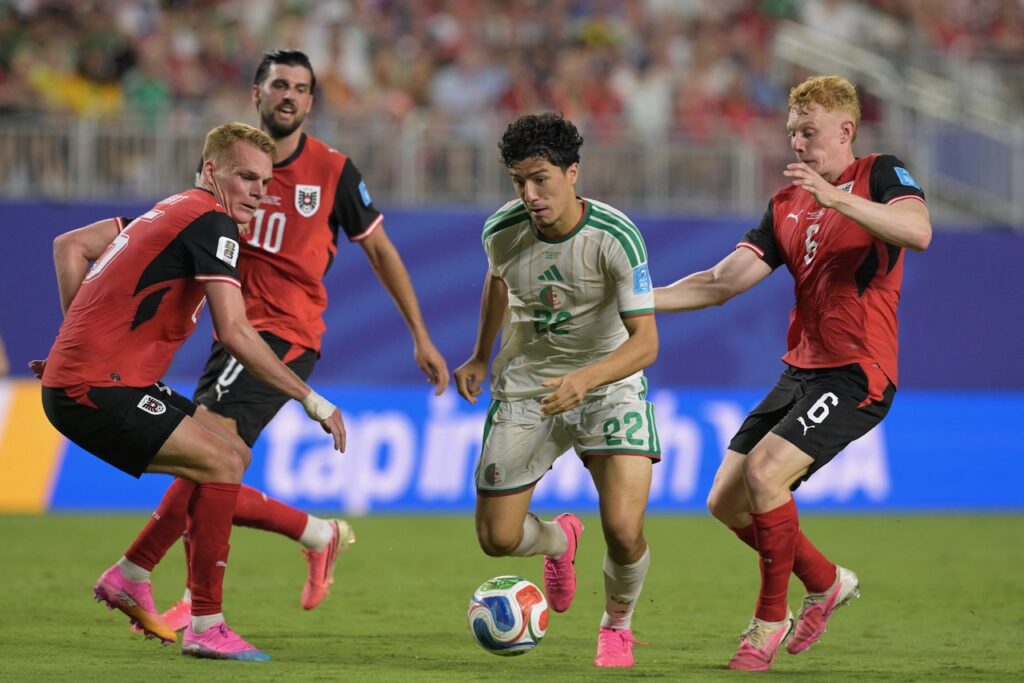 Algeria and Austria reach World Cup knockouts after 3-3 thriller