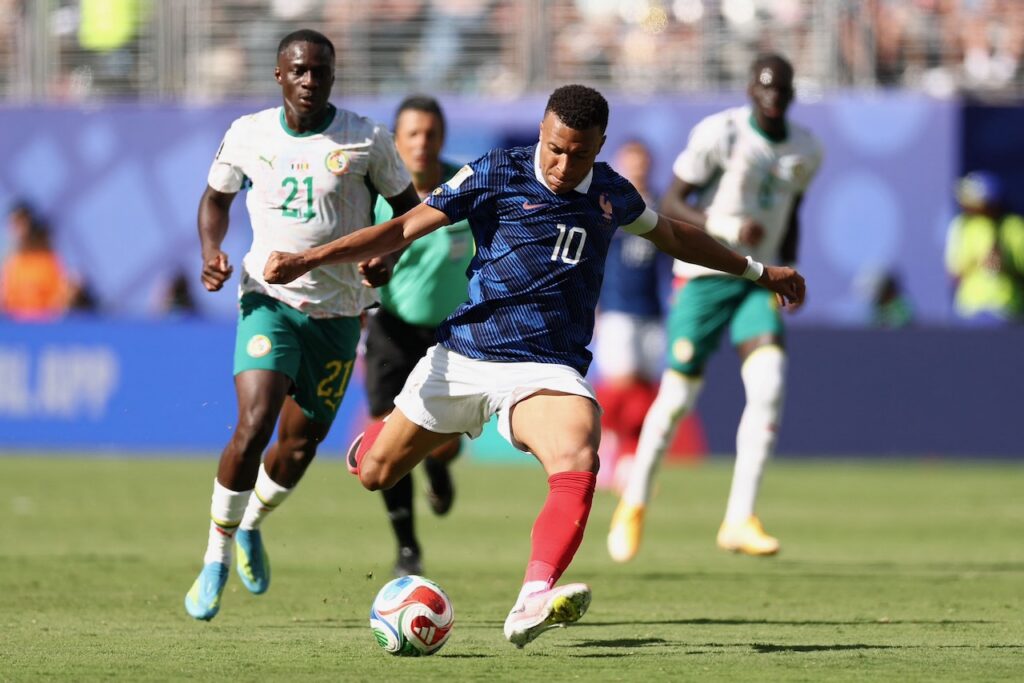 France and two goal Mbappe roar into World Cup
