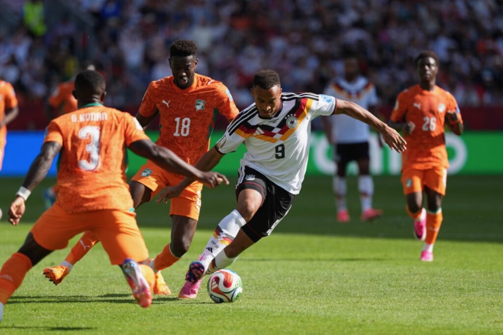 Germany come from behind to beat Ivory Coast and reach World Cup last 32