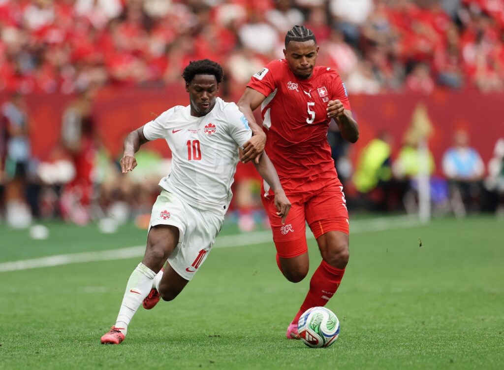 Switzerland down World Cup co-hosts Canada to top Group B, both progress