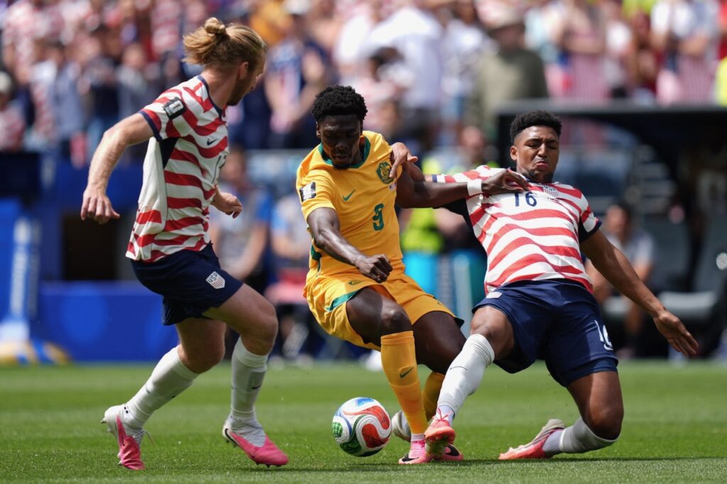 USA down Australia to reach World Cup knockout rounds
