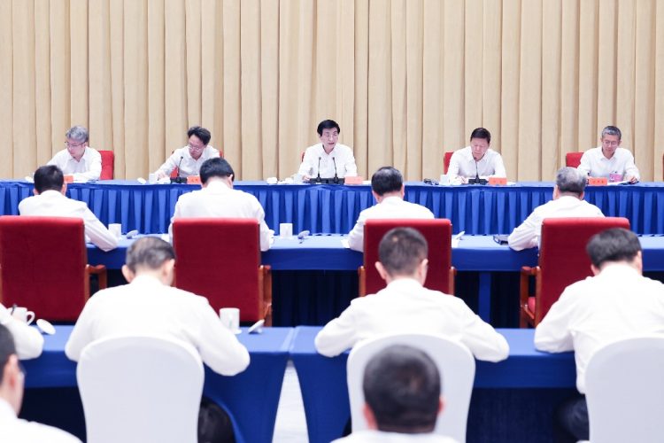 Top political advisor calls for peaceful development of cross-Strait relations, national reunification