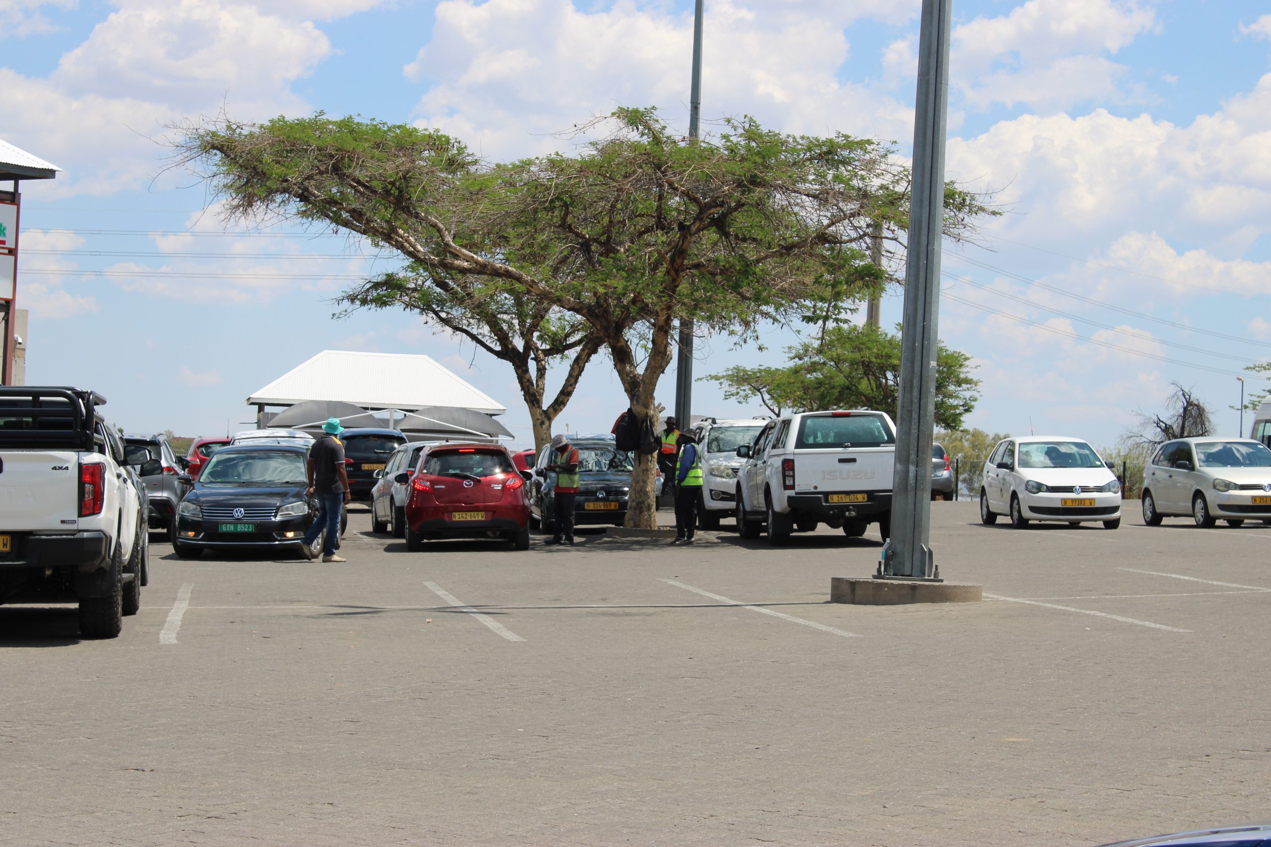 Car guarding in the 21-century....how the heroes of the parking lot pay rent from N$50...‘dealing with rude drivers’