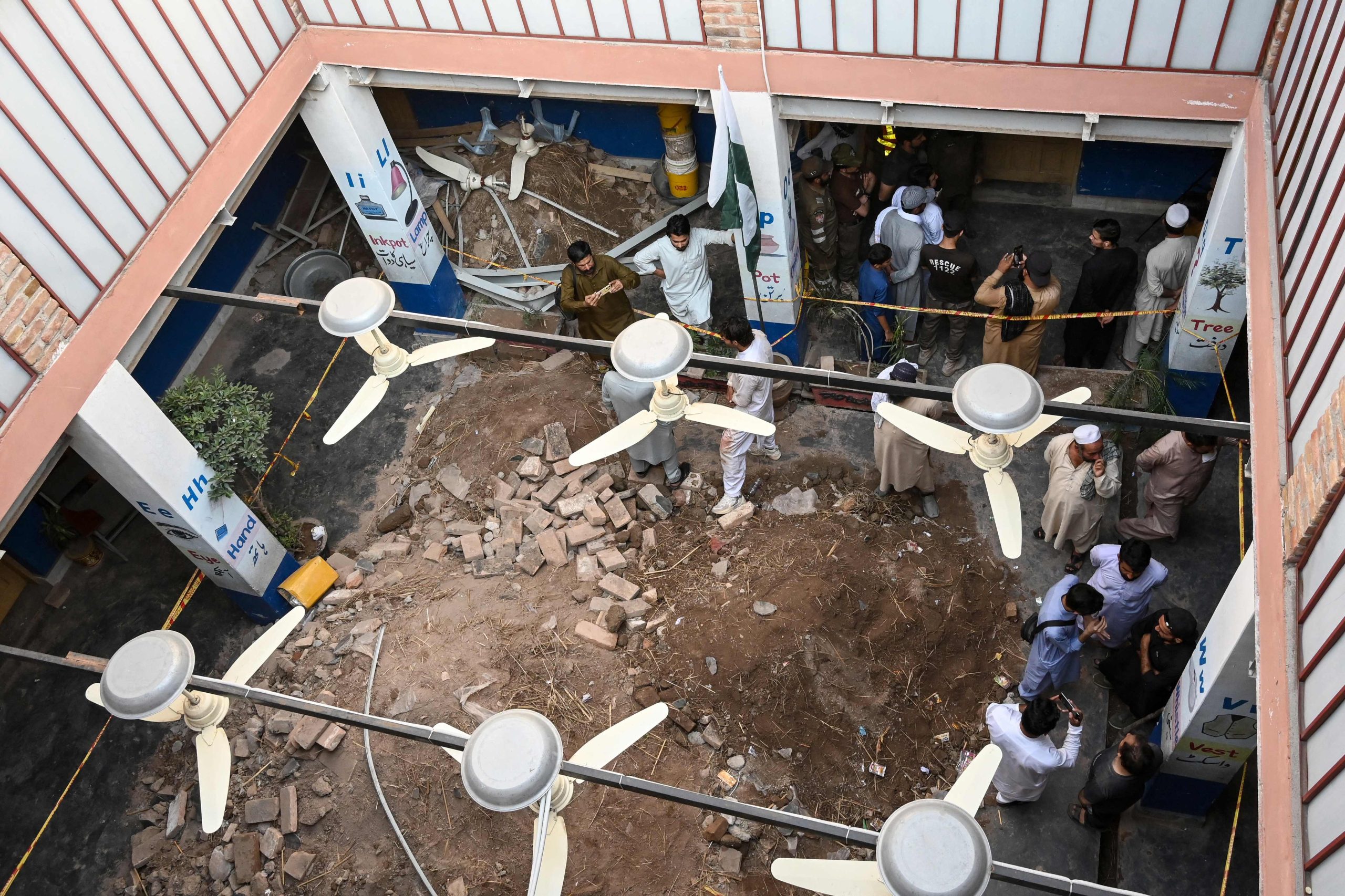 Families of children killed in Pakistan roof collapse demand justice